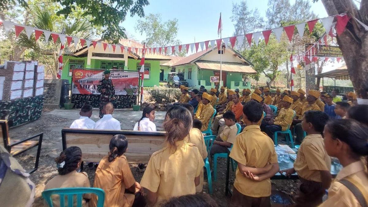 Satgas Pamtas RI-RDTL Yonif 742 Upacara Peringatan Hari Pahlawan bersama Siswa SD
