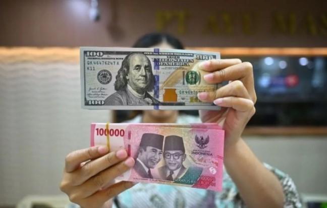 Sentimen Positif Ekonomi AS Tekan Nilai Tukar Rupiah di Pasar Spot dan JISDOR