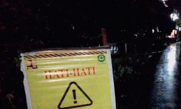 Jalan Amblas di Muara Enim Akibat Hujan Deras, BPBD Pasang Rambu Peringatan dan Batasi Akses