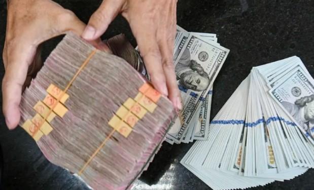 Rupiah Melemah ke Rp16.634 per Dolar AS, Analis Soroti Defisit Anggaran dan Kebijakan BI