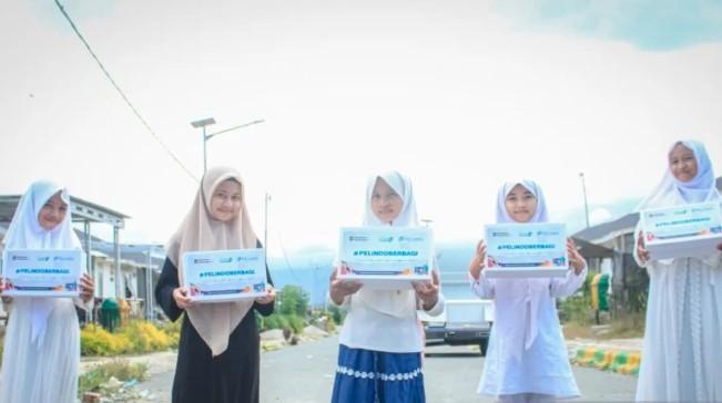 ODOJ dan Pelindo Bagikan 800 Sepatu untuk Anak di Huntap Tondo, Palu dalam Peringatan 7 Tahun Bencana