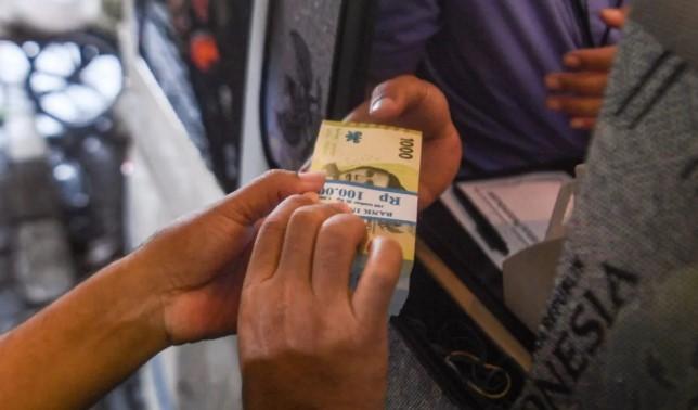 Rupiah Menguat Tipis ke Rp16.870, Tapi Terancam Melemah akibat Ancaman Tarif AS terhadap Negara Mitra Dagang Iran