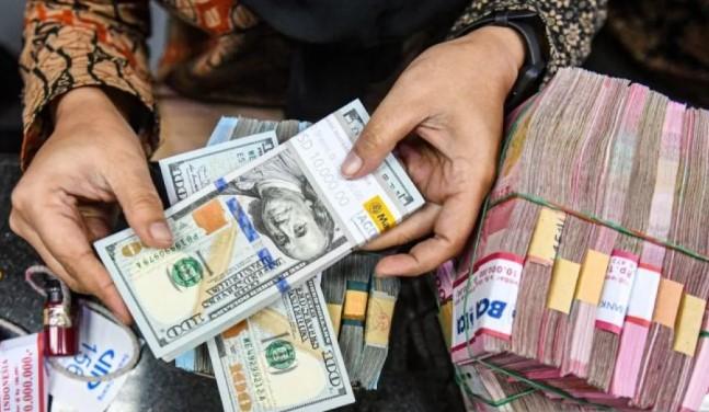 Rupiah Menguat Tipis ke Rp16.987 per Dolar AS Dipicu Sikap Dovish The Fed