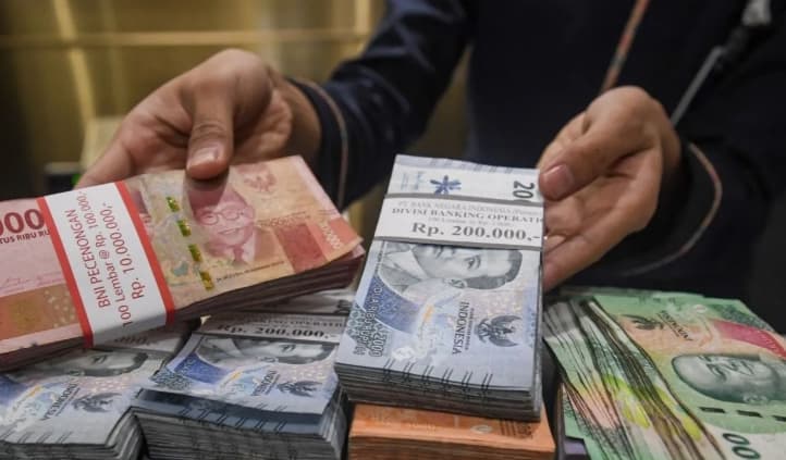 Rupiah Tembus Rp18.021 per Dolar AS, Bank Indonesia Gencarkan Intervensi saat IHSG Anjlok 8 Persen
