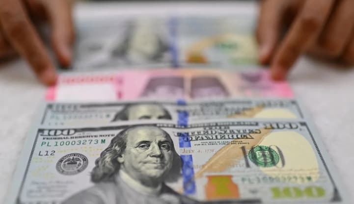 Rupiah Melemah ke Rp18.074 per Dolar AS pada Jumat 23 Oktober 2026, Turun 14 Poin di Awal Perdagangan
