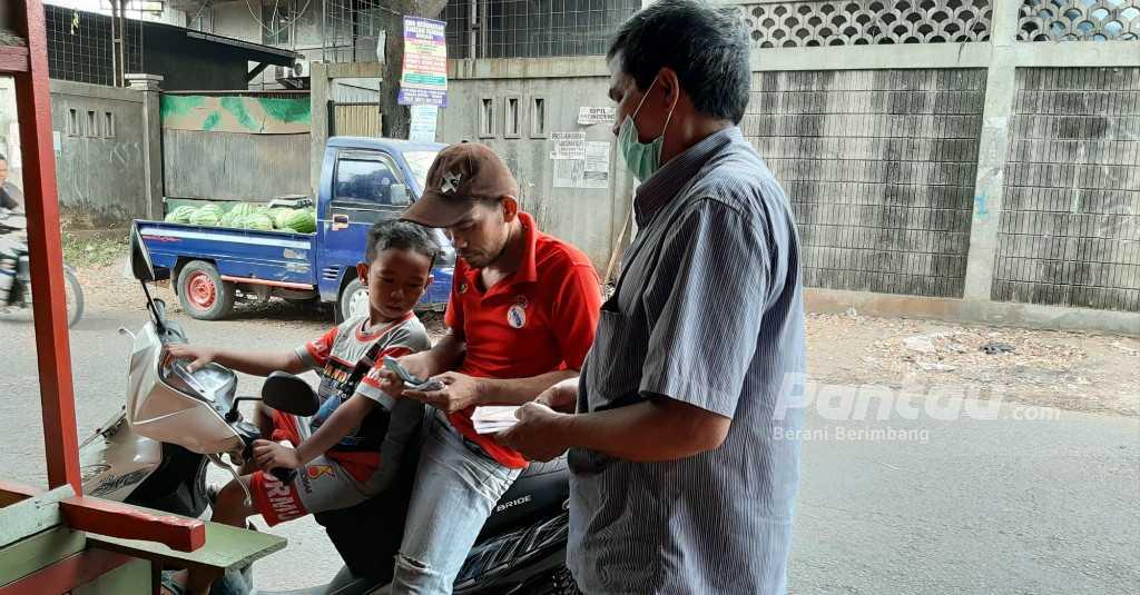Jasa Penukaran Uang Receh Bisa Putarkan Uang Rp400 Juta Tiap Lebaran