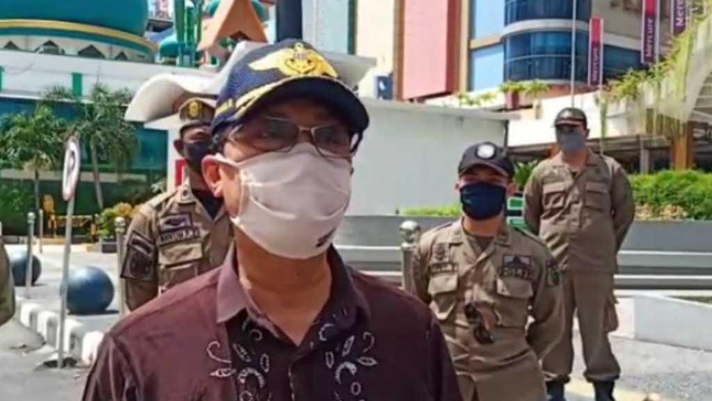 Berani Keluyuran saat PSBB Banjarmasin? Hati-hati Ditebas Rotan Satpol PP