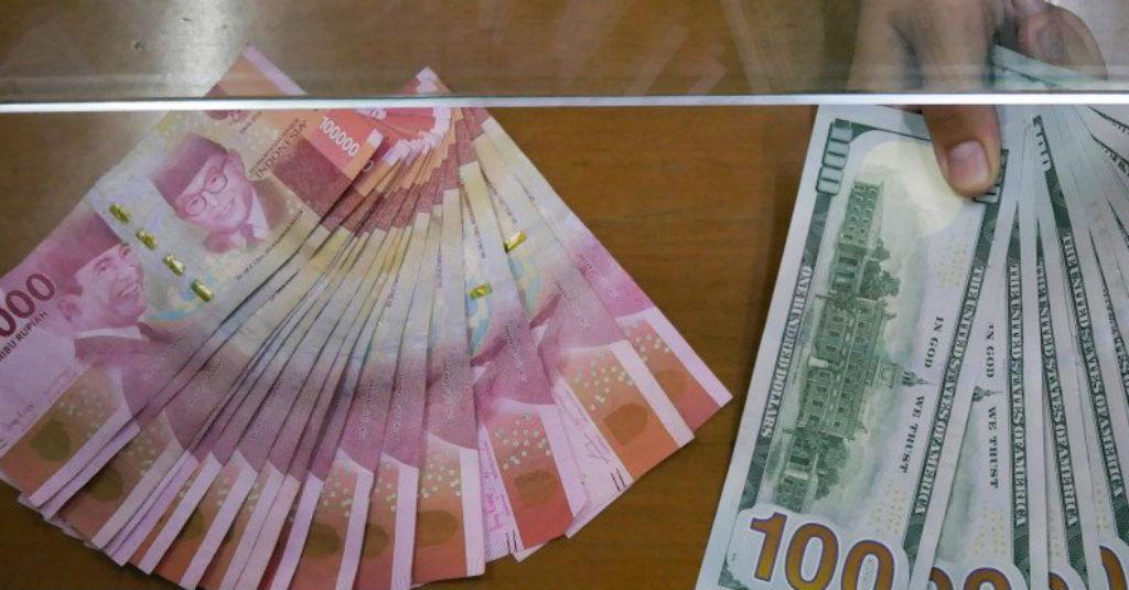 Rupiah Ditutup Melemah Tipis Jelang Rapat The Fed