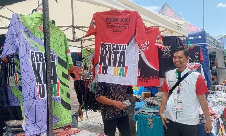 Pedagang Kaos PON XXI Raup Omzet Puluhan Juta per Hari di Ajang Nasional