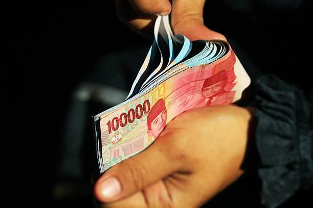 Kekhawatiran Investor atas Ekonomi Global Jerumuskan Rupiah ke Zona Merah