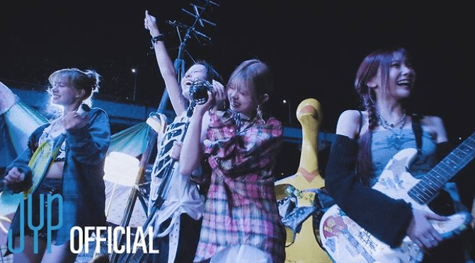 NiziU Rilis Video Lagu “What If”, Lagu J-ROCK Ceria yang Cerahkan Musim Semi