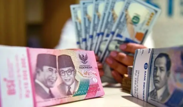 Rupiah Menguat Tipis di Tengah Antisipasi IKK dan Kebijakan Suku Bunga The Fed