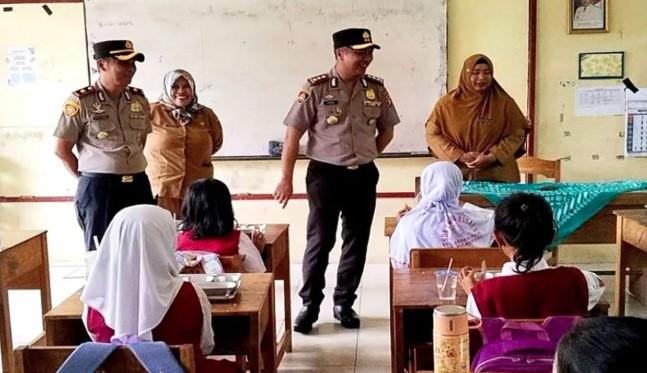 Polres Pulang Pisau Salurkan MBG Perdana ke 1.138 Peserta Didik dan Kelompok 3B