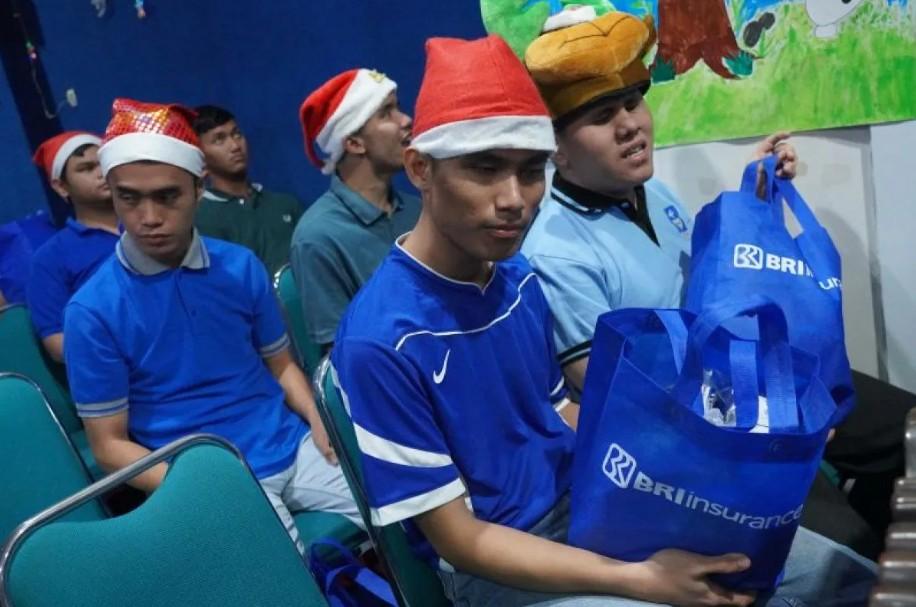 BRI Insurance Salurkan Bantuan Sosial Natal 2025, Tegaskan Komitmen Kepedulian Sosial dan Pertumbuhan Berkelanjutan