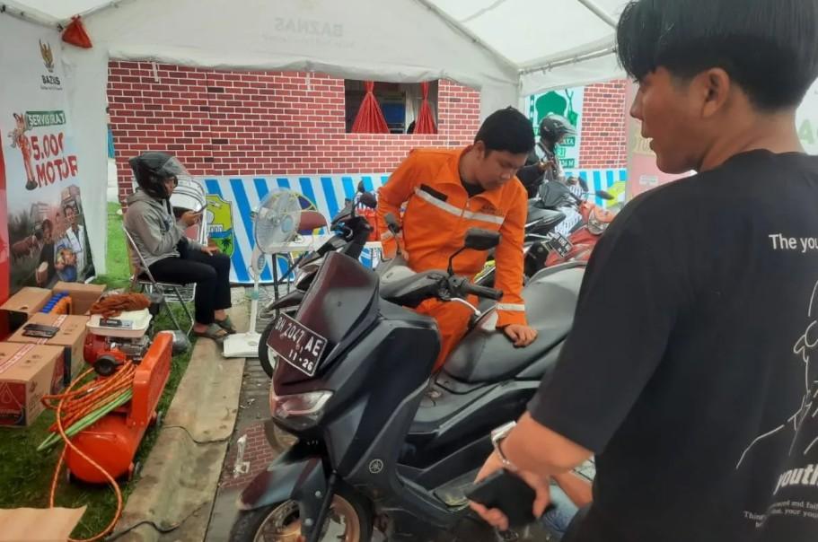 Baznas Provinsi Jambi Gelar Layanan Ganti Oli Gratis di Jalur Mudik untuk Tingkatkan Kenyamanan Pemudik