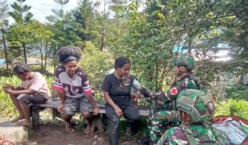 Satgas Yonif 136/TS Gelar Cek Kesehatan Gratis di Puncak Jaya, Warga Antusias Sambut Layanan Keliling