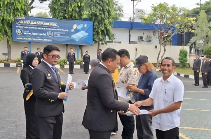 Seniman Damsi Tarmizi Mendapat Pencatatan Hak Cipta setelah 30 Tahun Menekuni Seni Perkotaan