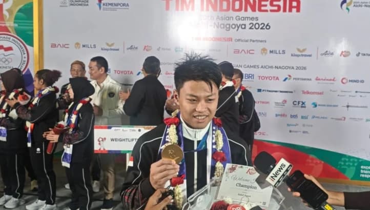 Rahmat Erwin Persembahkan Emas Asian Games untuk Keluarga, Pecahkan Dua Rekor Dunia