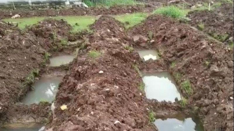 Duh, Puluhan Liang Lahat untuk pasien COVID-19 di Jakarta Terendam Air Hujan