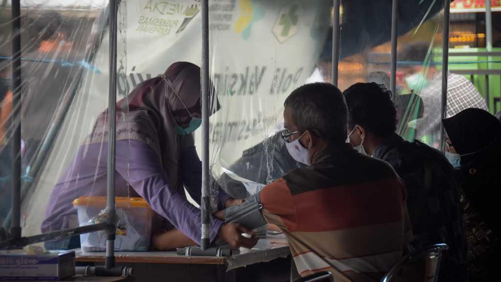 Bertolak ke Tarakan, Jokowi Langsung Tinjau Vaksinasi Langsung dari Pintu ke Pintu