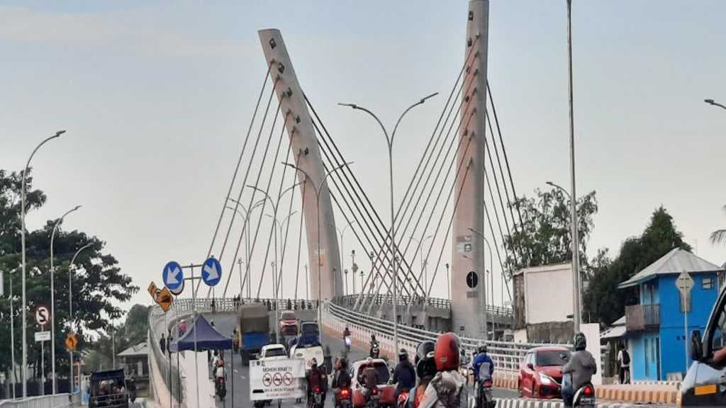 Pengamat Ungkap Makna Dibalik Kunjungan Jokowi ke Kalsel Resmikan Jembatan Sei Alalak