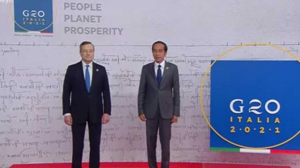 Kenakan Jas Berwarna Abu, Jokowi Disambut PM Italia saat Hadiri KTT G20 di Roma